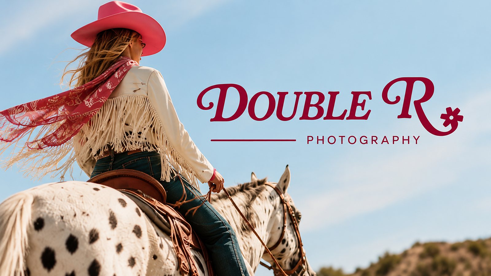 Direction Two environmental application — a cowgirl on an appaloosa horse photographed against a bright sky, with the burgundy script Double R Photography wordmark set across the sky portion of the frame.