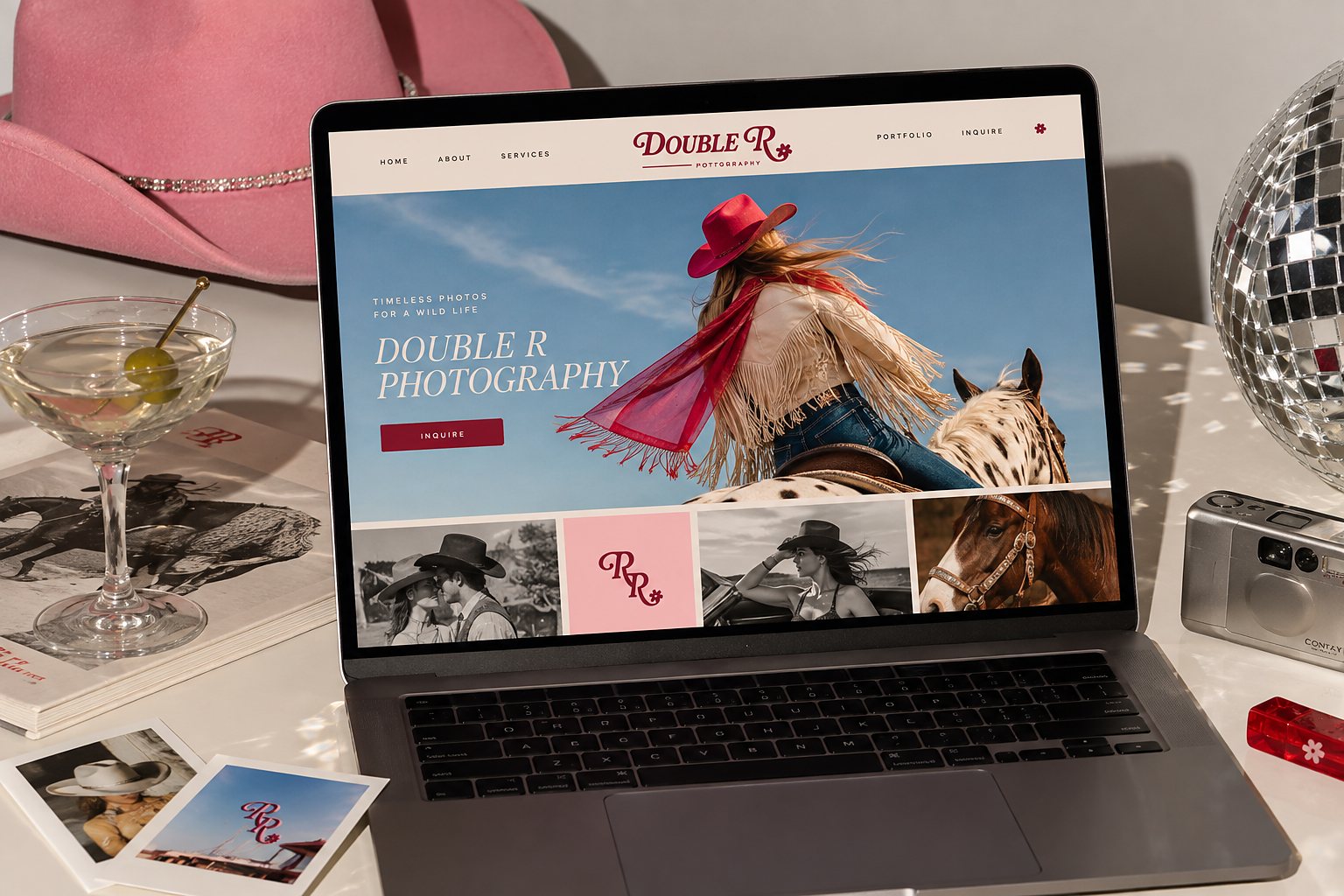 Laptop mockup showing the Direction Two Double R Photography website — the script Double R wordmark set over a Palm-Springs-styled scene of a cowgirl, pink hat, and disco ball with a martini glass in the foreground.